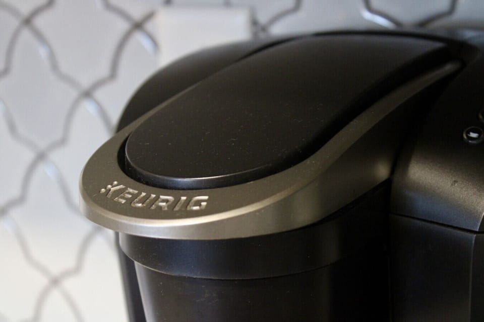 Kitchen: Small space, big caffeine energy. Everything you need for a perfect morning brew.
