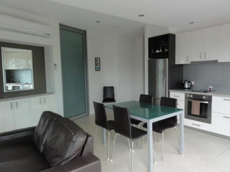 Executive Apartment, 2 Bedrooms, Balcony, Partial Ocean View | Living area | 49-inch flat-screen TV with digital channels, Smart TV, Netflix