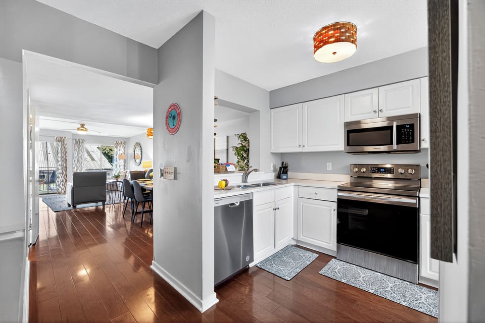 Fully stocked with cookware, utensils, and small appliances