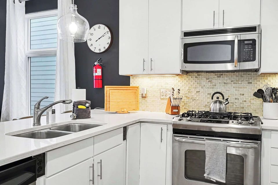 The fully stocked kitchen is equipped with everything you need to prepare meals for yourself and your guests, making dining in easy, convenient, and enjoyable throughout your stay.