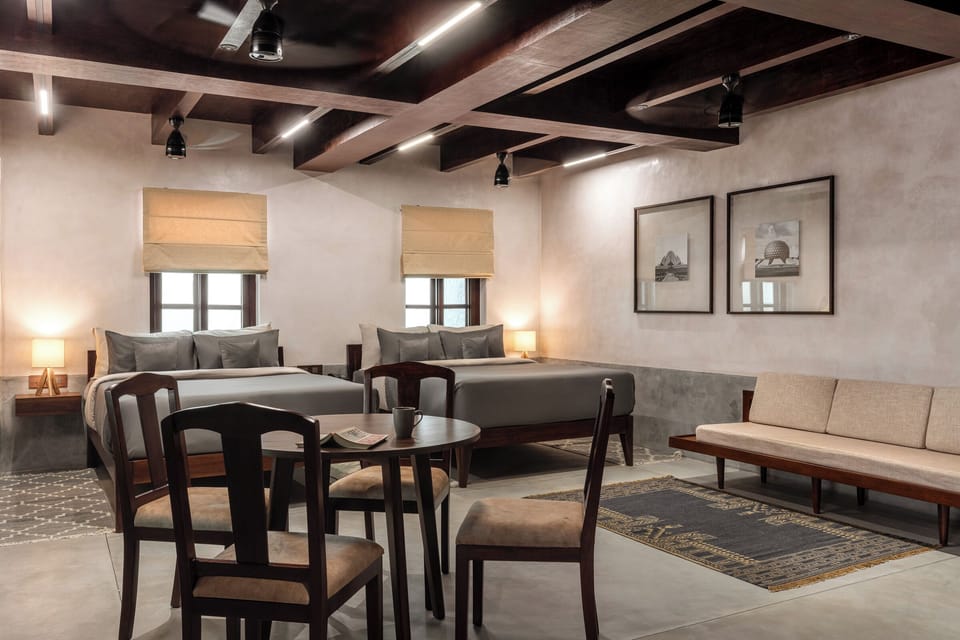 Deluxe Suite, Balcony, City View | Minibar, in-room safe, blackout drapes, iron/ironing board