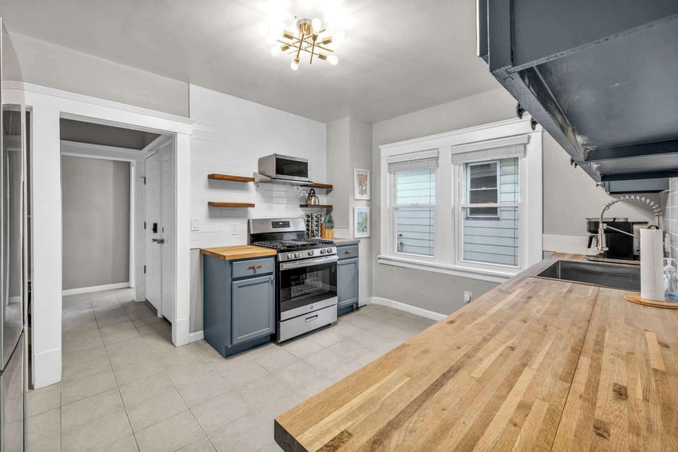 A bright, open kitchen designed for effortless cooking and gathering. With ample counter space and inviting style, it’s the perfect place to create meals, memories, and moments that feel right at home.