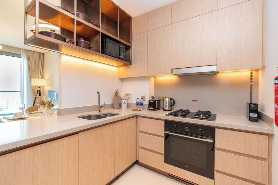 Luxury Apartment, City View | Private kitchen | Full-size fridge, microwave, oven, stovetop