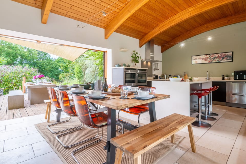 First floor: Dining area, back to kitchen and outdoors