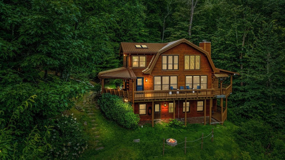 Lodge in the woods! Stunning 4-BR cabin surrounded by lush forest.