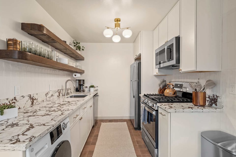 Modern kitchen with island and updated appliances