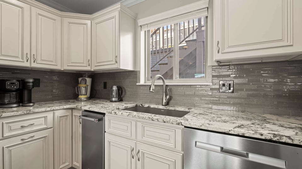 The open kitchen is well equipped for an unforgettable getaway​