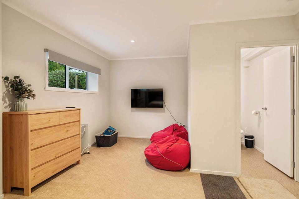 Bunk Room with bean bags and a TV