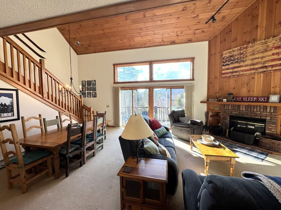 Open concept with dining and living room. Access to large deck with amazing view