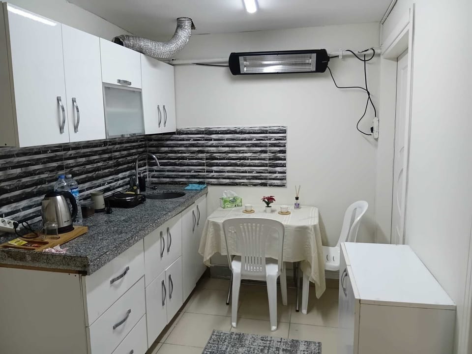 Classic Apartment - Basement Floor | Private kitchen | Microwave, stovetop, electric kettle, highchair