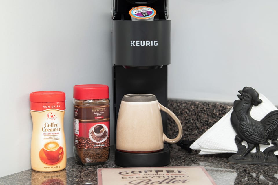 Cozy coffee corner stocked with essentials to start your mornings right.