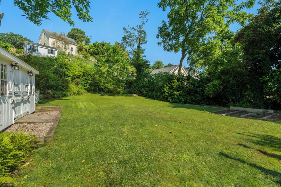 The depth of the backyard is a rarity amongst downtown Mystic homes 