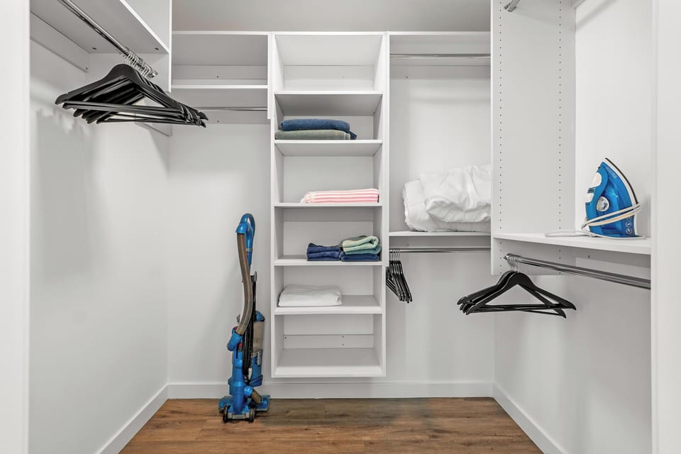 Expansive, organized custom closet system—plenty of room to unpack.