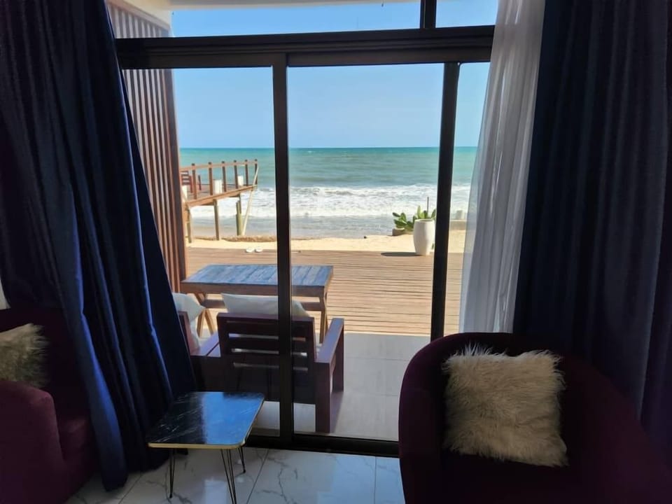 Deluxe Suite, 1 King Bed, Sea View, Beachfront | Premium bedding, minibar, desk, laptop workspace