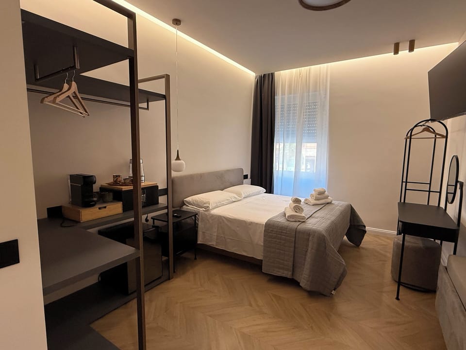 Luxury Quadruple Room, City View | In-room safe, iron/ironing board, free WiFi