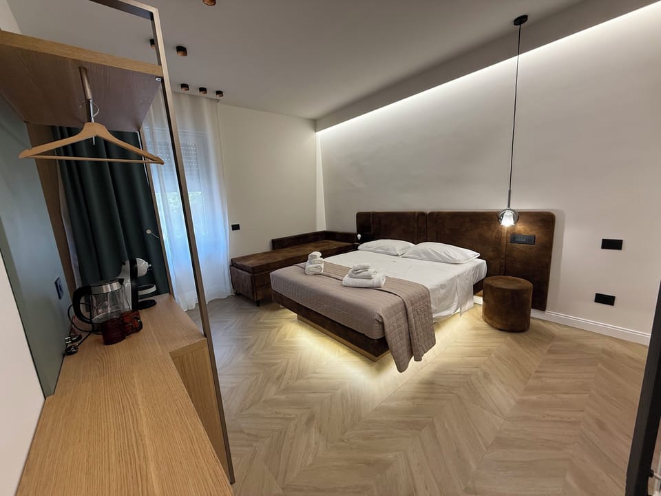 Luxury Quadruple Room, City View | In-room safe, iron/ironing board, free WiFi