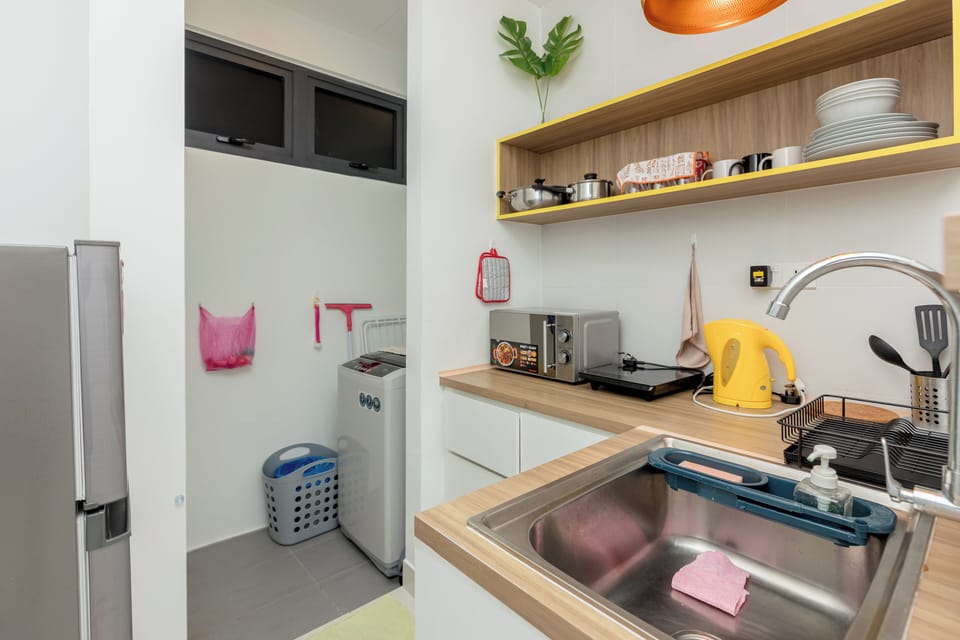 Fridge, electric kettle, cookware/dishes/utensils