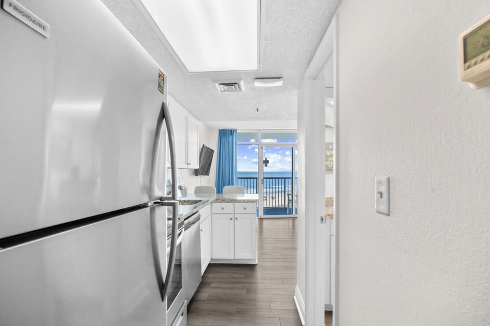 Large Refrigerator and kitchen area