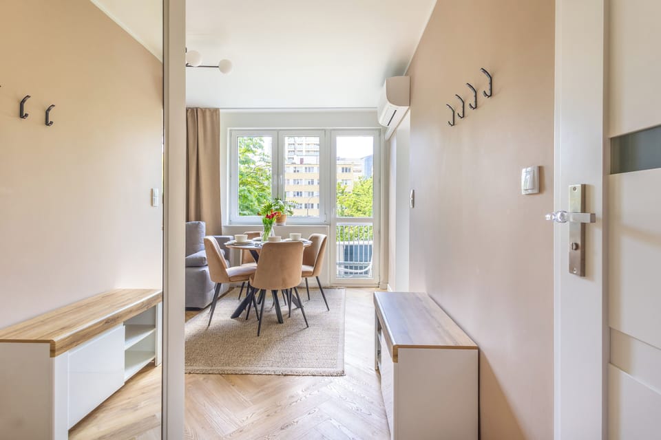 Apartment, City View | Living area | 55-inch Smart TV with cable channels