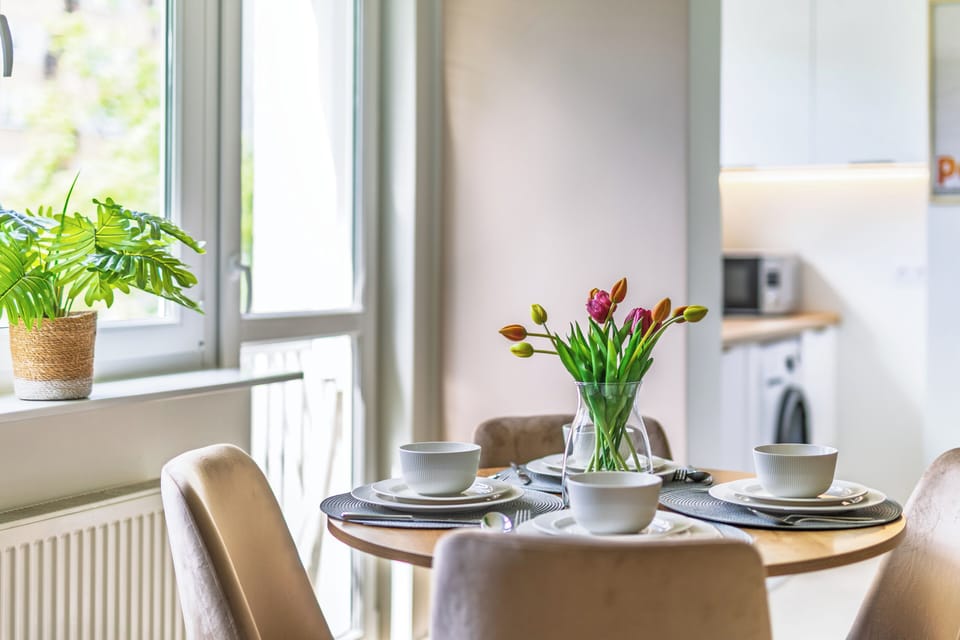 Apartment, City View | Living area | 55-inch Smart TV with cable channels