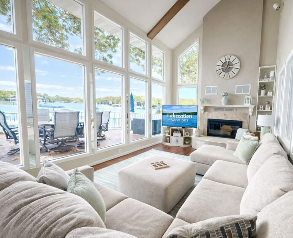 Lakeside living room with floor-to-ceiling windows