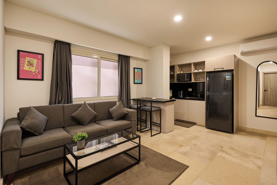 Apartment, 1 Bedroom, Courtyard View | Living area | 55-inch Smart TV with digital channels, Netflix, streaming services