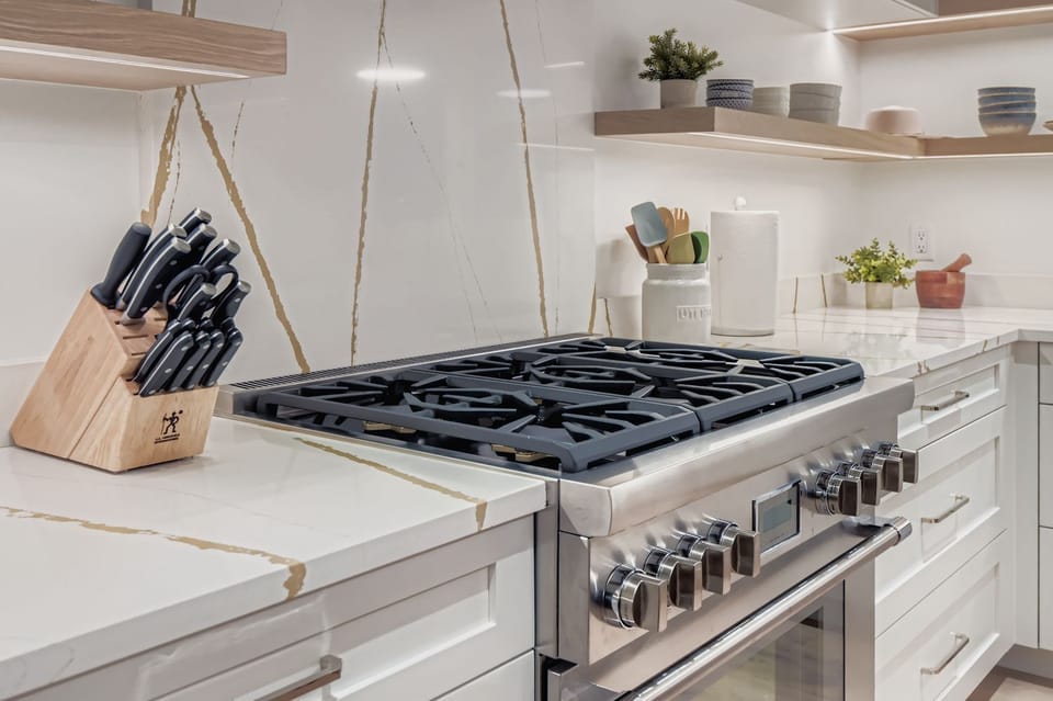 Whip up a feast on the professional gas range with signature Star® burners, then enjoy your meal in the open-concept great room.