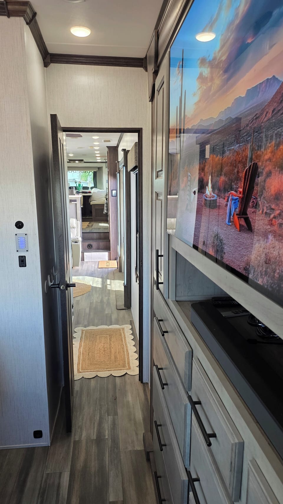 View down the hallway to the luxury living area and gourmet kitchen
