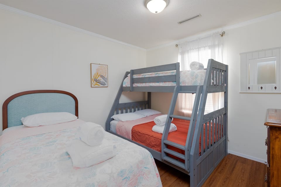 Bedroom 4 offers a Double-size bed and a twin-over-full bunk