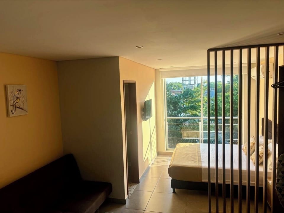 Studio Suite, City View | Iron/ironing board, WiFi (free), bed sheets