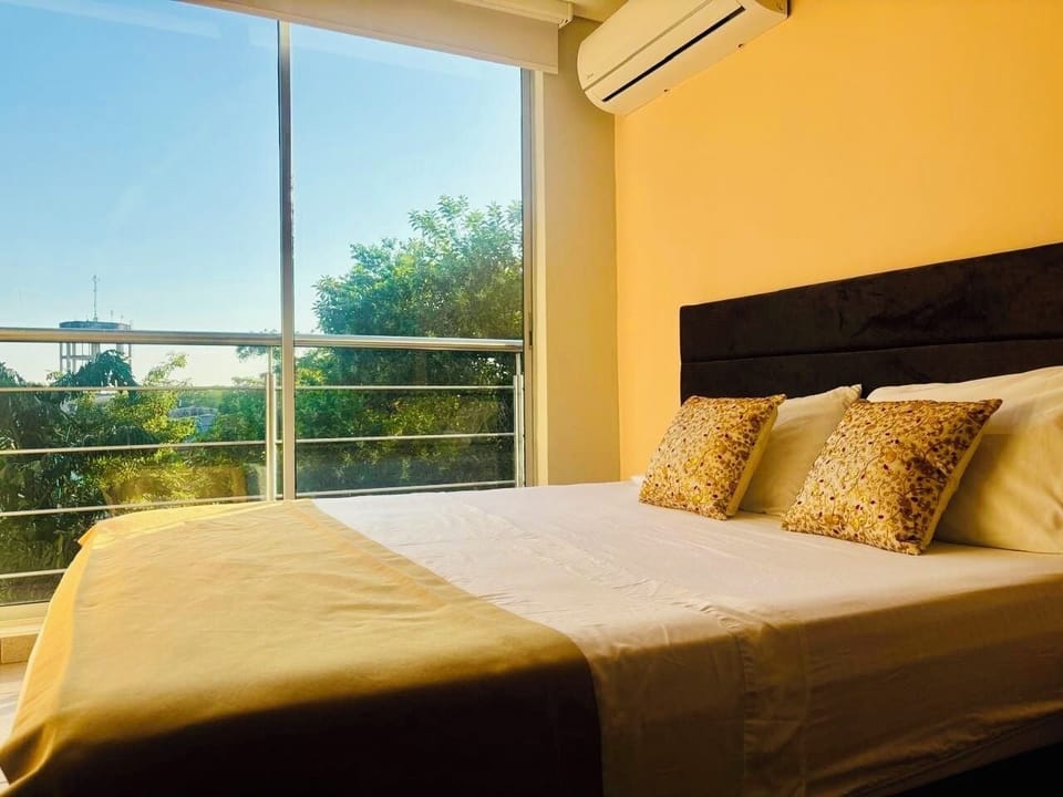 Studio Suite, City View | Iron/ironing board, WiFi (free), bed sheets