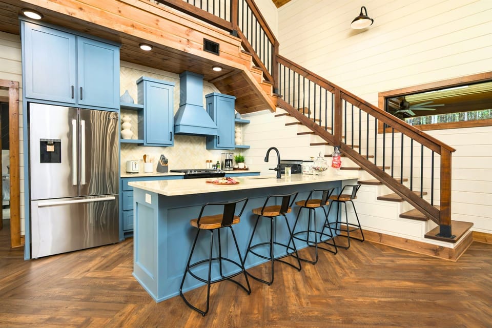 Kitchen: Whip up delicious meals in our stunning blue-accented kitchen! Perfect for gatherings!