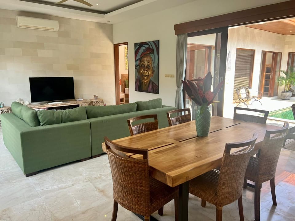 open plan living and dining with Smart TV