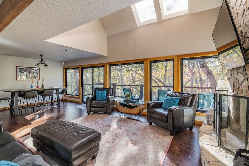 An expansive gathering space filled with natural light, ideal for large families or multi-family stays to relax and reconnect.