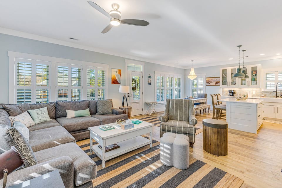 Living area: Complete with comfortable sofa for downtime relaxation. (Adjacent to the kitchen and dining area)