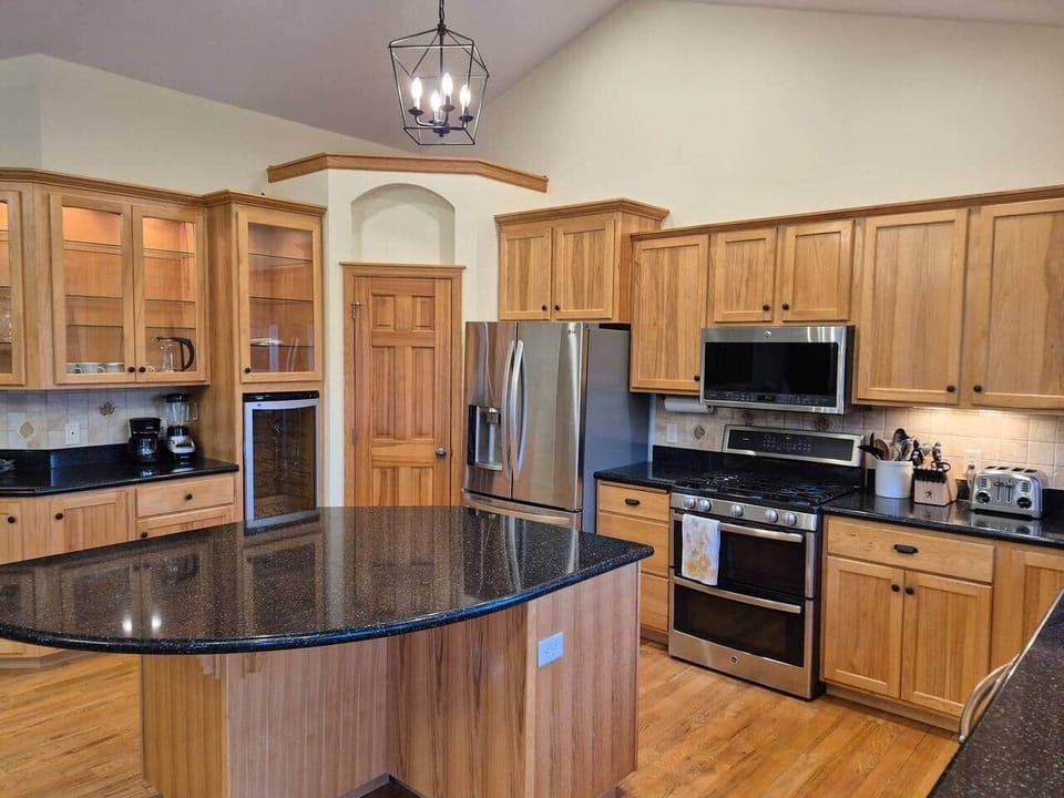 The full kitchen has nearly new high-end GE Profile appliances.