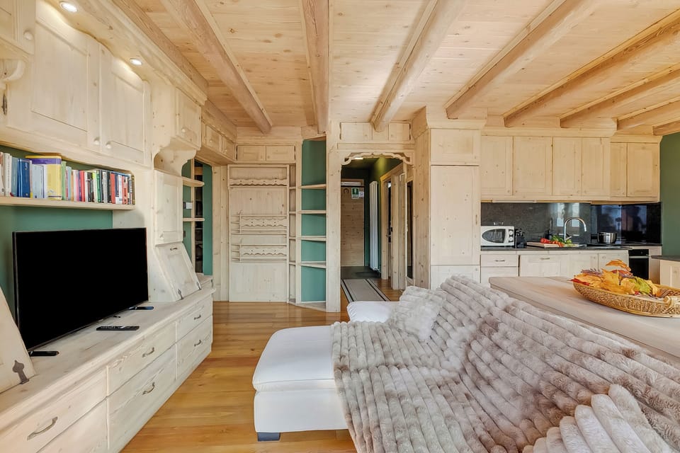 Family Apartment, 3 Bedrooms, 2 Bathrooms (Baita Delle Stelle) | Living area | Flat-screen TV