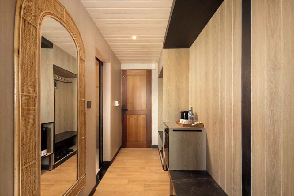 Deluxe Suite, Balcony, Garden View | Premium bedding, pillowtop beds, minibar, in-room safe