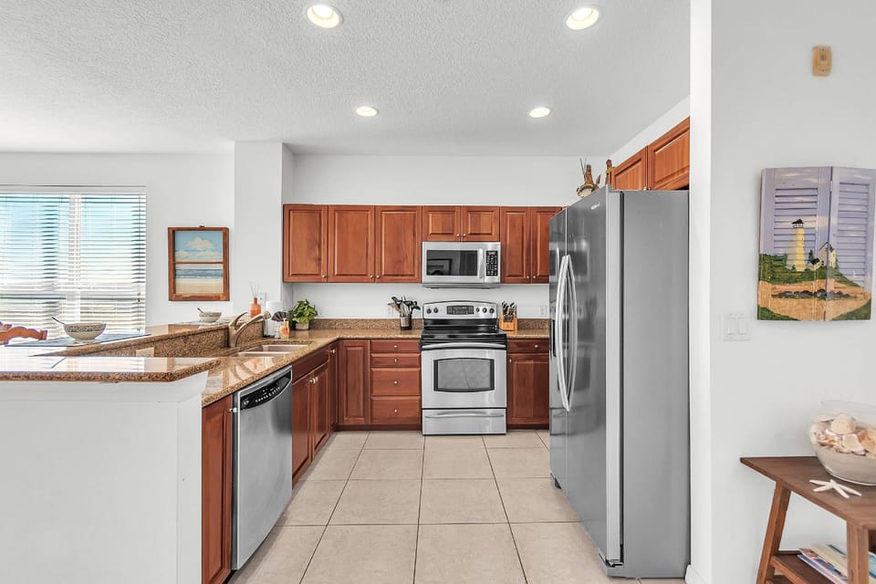 Large Kitchen layout with stainless steel appliances