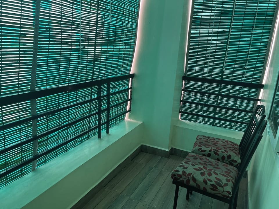 Family Apartment, Balcony | Living area | 42-inch flat-screen TV with digital channels, TV