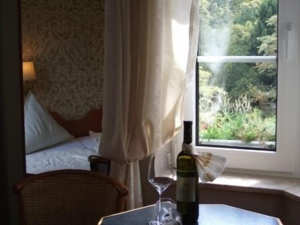 Standard Double Room | Living area | Flat-screen TV