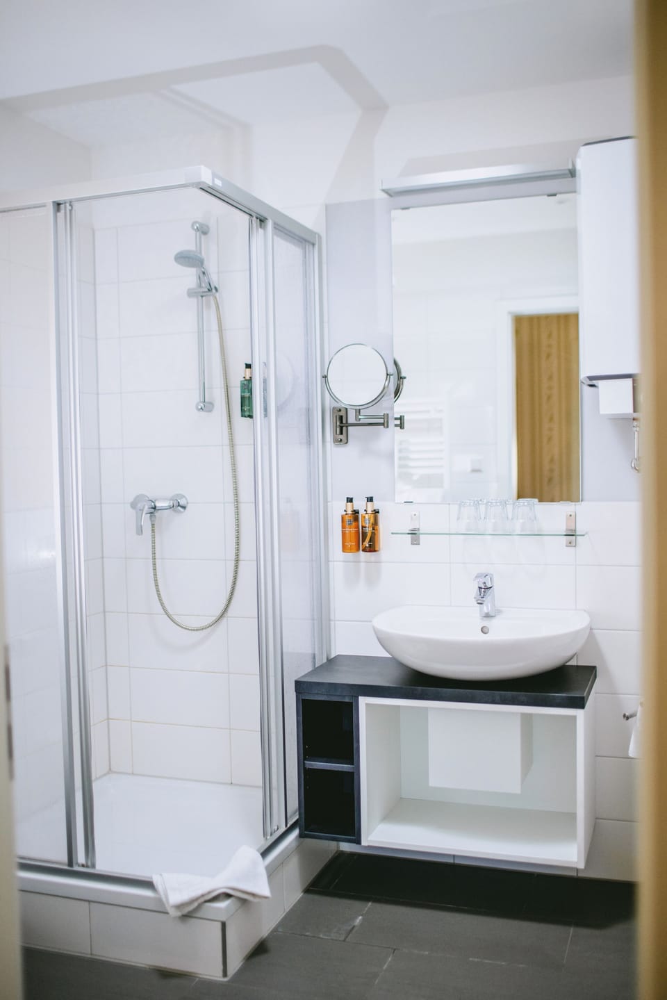 Shower, hair dryer, soap, shampoo