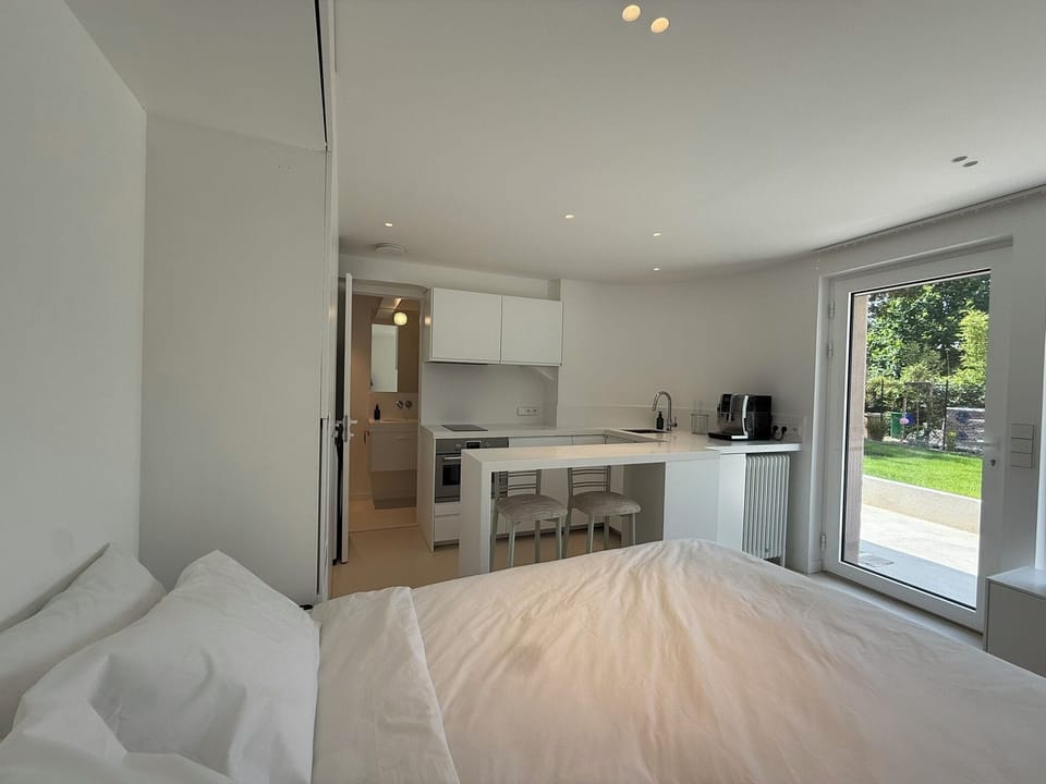 Apartment, Garden Area | Blackout drapes, soundproofing, iron/ironing board, free WiFi