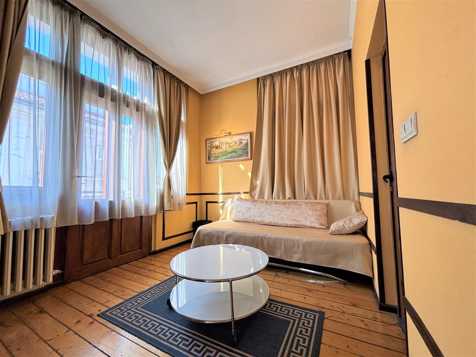 Deluxe Double Room, Balcony, City View | In-room safe, desk, soundproofing, iron/ironing board