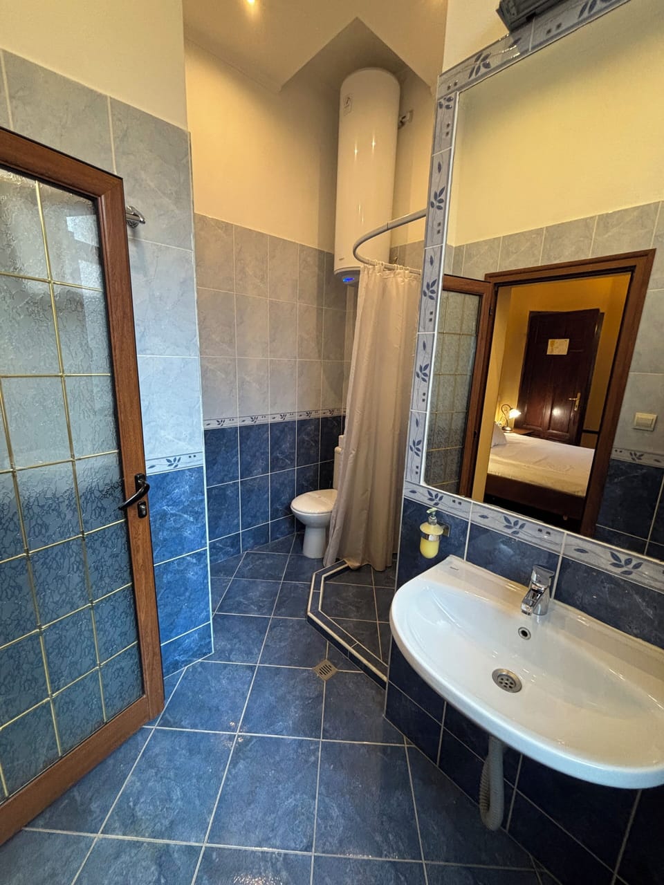 Double Room | Bathroom | Shower, hair dryer, slippers, towels