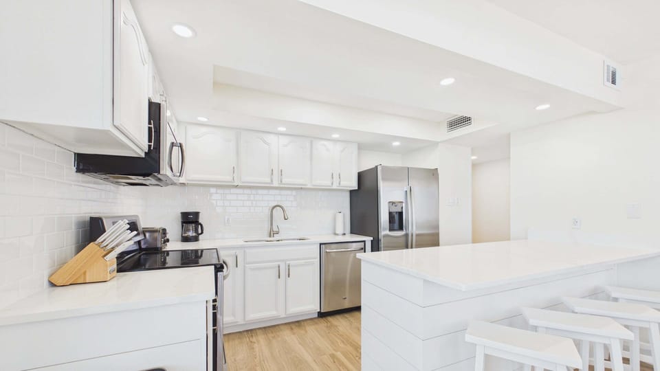 Newly renovated kitchen with all the cooking essentials and stainless appliances