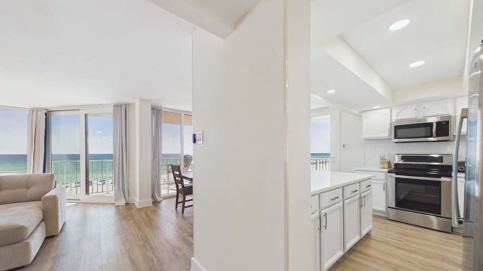Walk into your open concept living, dining, and kitchen areas all flowing together with brand new floors
