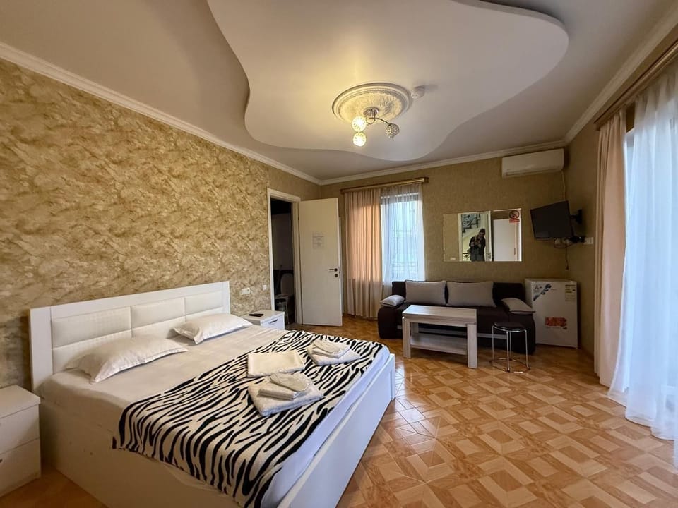 Shower, rainfall showerhead, designer toiletries, hair dryer