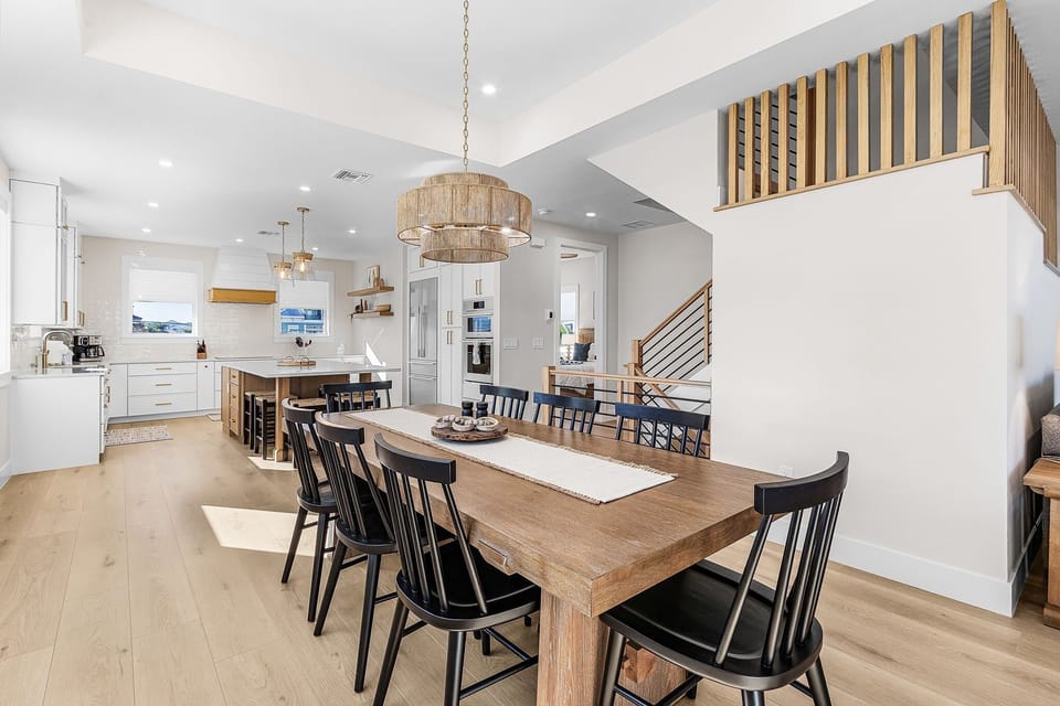 Seating for eight at the large farmhouse-style table