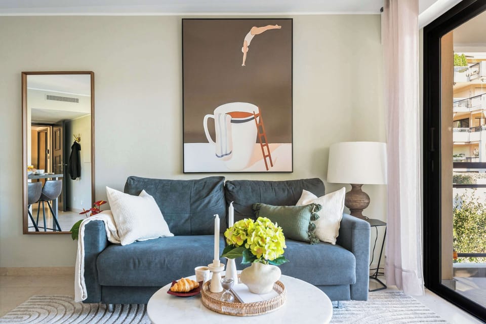 Art-forward living space blending comfort and creativity — sip wine or read with views just a step away.